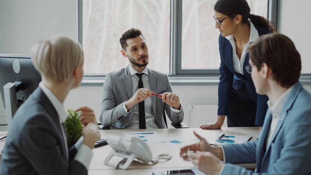 A business team collaborating around a table