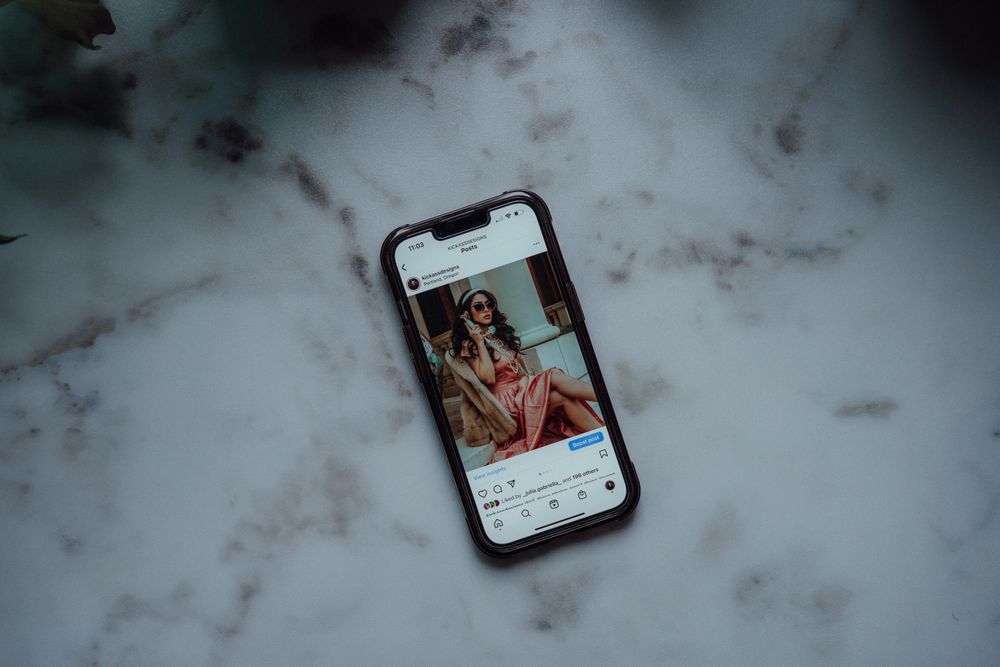 A smartphone displaying a social media post